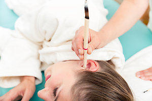 Ear Candling. Ear candling